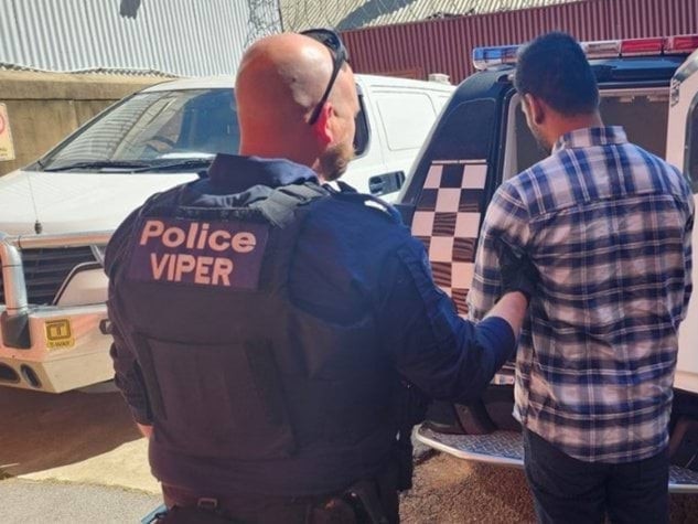 VIPER taskforce members arrest Inderpreet Singh after a major operation into an alleged $3m retail theft syndicate. Picture: Victoria Police