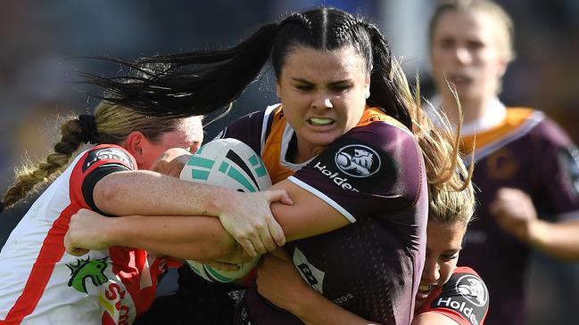 Amber Pilley on the charge for the Broncos. Picture: AAP