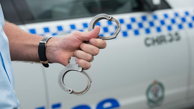 NSW police at coffs harbour boat ramp, arrest , gun, shots, handcuffsPhoto: Trevor Veale / The Coffs Coast Advocate