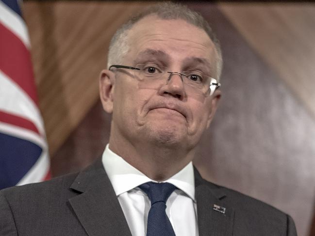 Treasurer Scott Morrison holds a press conference at Treasury Place in Melbourne, Australia, Friday, April 20, 2018. Mr Morrison has announced tough new penalties for shonky bankers and corporate criminals (AAP Image/Luis Ascui) NO ARCHIVING