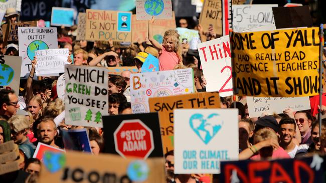 School students take to the streets of Melbourne as part of a nationwide strike to raise awareness of climate change. Picture: Stuart McEvoy