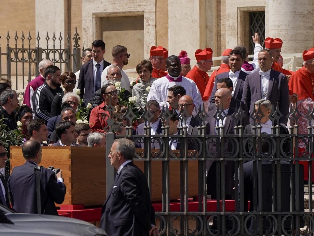 The Pope's simple wooden casket is seen arriving at Basilica Santa Maria Maggiore after the Vatican funeral service on April 26 in Rome, Italy. Picture: Michael Robinson Chavez/Getty Images