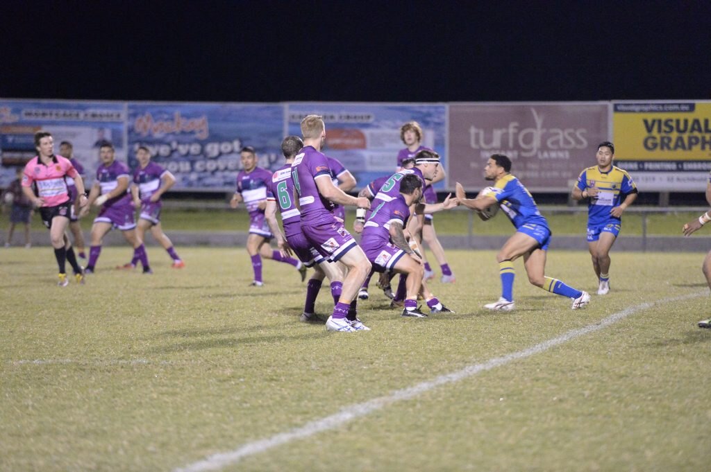 Brothers swap their navy blue to wear the purple jerseys with pride. . Picture: Madolyn Peters