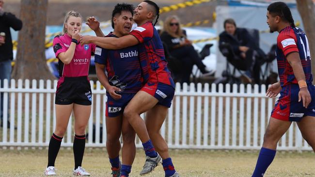 Raymond Mu celebrates his hat-trick of tries for Campbelltown Collegians reserve grade against Thirlmere Roosters at Bradbury Oval. Picture: Steve Montgomery