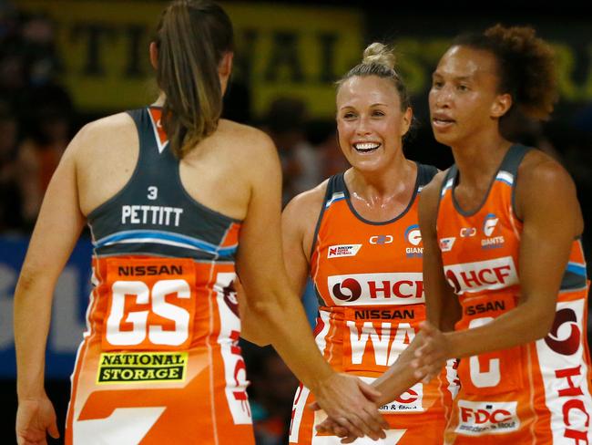 Susan Pettitt, Kimberlee Green and Serena Guthrie after winning the minor premiership.