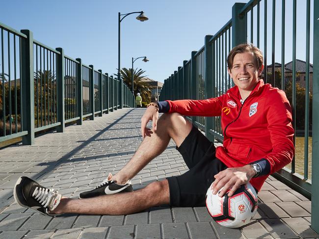 Craig Goodwin poses for a picture in Mawson Lakes, after returning to Adelaide United after successfully playing for Dutch club, Sparta Rotterdam, Thursday, Sept. 13, 2018. Picture: MATT LOXTON