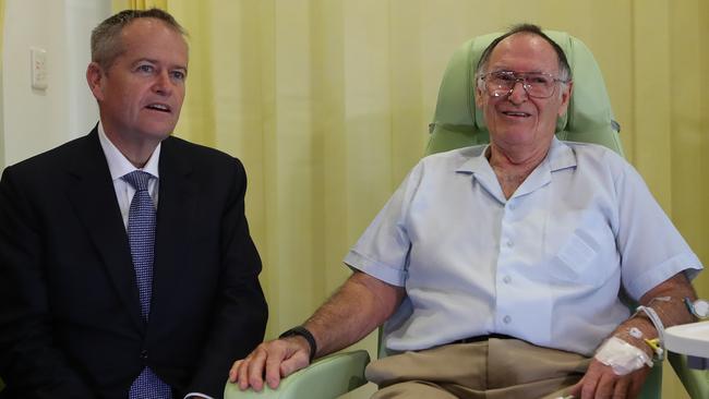 Bill Shorten talking to cancer patient Don Moffatt in the chemotherapy unit at St John of God hospital in Perth. Picture: Kym Smith.