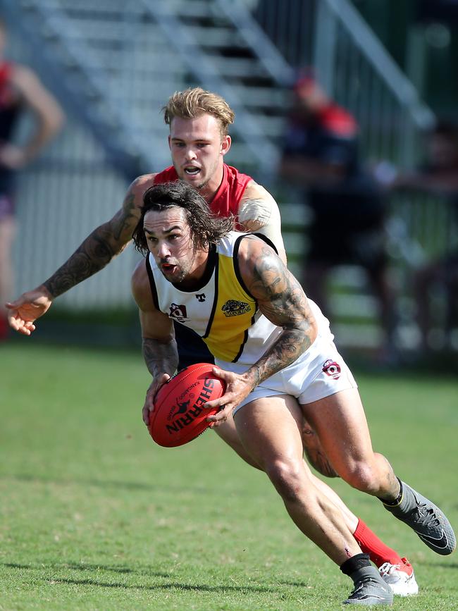 Round 4 QAFL Australian rules game between Surfers Paradise Demons (blue) and Labrador Tigers at Sir Bruce Small Park. Photo of Alex McKay. Photo by Richard Gosling