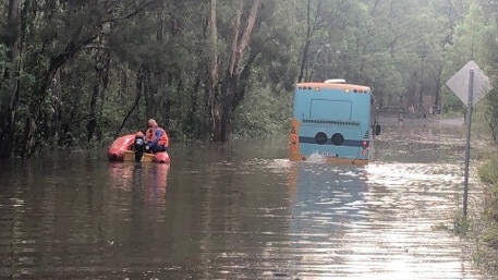 The bus stuck in flood waters at Maraylya. Picture: Oakville Rural Fire Brigade.