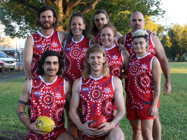 INDIGENOUS JUMPER: Ahead of the march on May 29, 2021, players from the Lismore Swans senior men's and women's squads don the distinctive jumper designed by team mate Talarra Berry. LR Front - Kubilay Karhan and Hendrik Hoogendoorn. Back - Lucan Foenander, Emma Stoddart, Laura Cahill, Matthew Schafer and Liv Castanga Photo: Alison Paterson