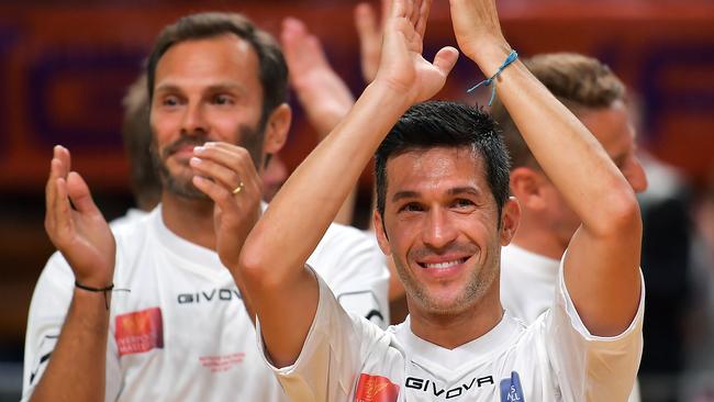 Luis Garcia of Liverpool applauds the crowd.