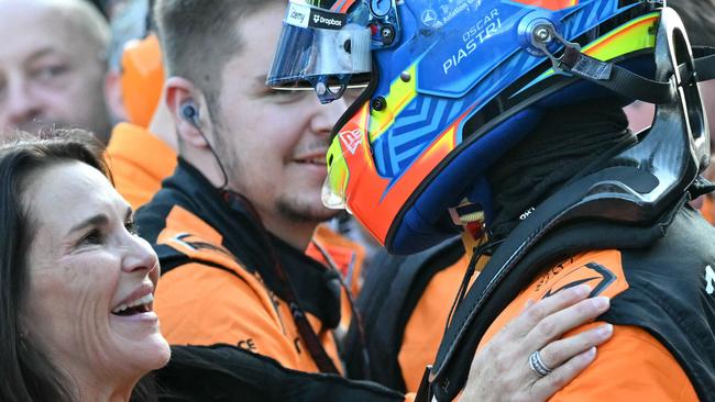 McLaren's Australian driver Oscar Piastri celebrates with his mother Nicole Piastri after winning the Formula One Azerbaijan Grand Prix at the Baku City Circuit in Baku on September 15, 2024. (Photo by Andrej ISAKOVIC / AFP)