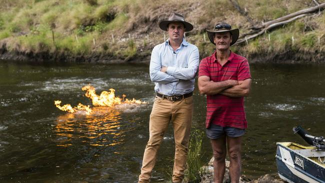 Greens MP Jeremy Buckingham with resident John Jenkyn after he set fire to gas along the Condamine River.