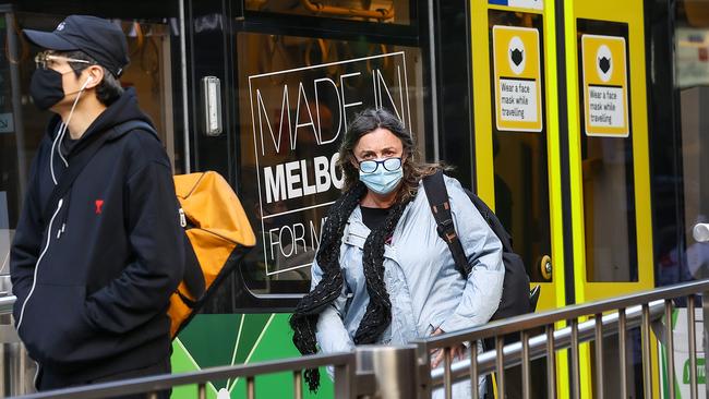 Masks are mandatory on public transport. Picture: NCA NewsWire / Ian Currie