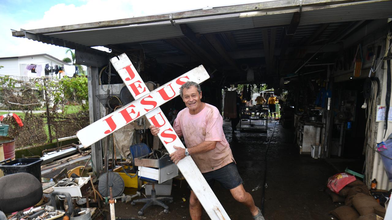 Wednesday February 13. Heavy rain causes flooding in North Queensland. Clean up after flooding in Ingham. Rural firefighters from southern Queensland and NSW help clean up Pastor Joe Marolla's home in Skinner Street. Pastor Marolla. Picture: Evan Morgan