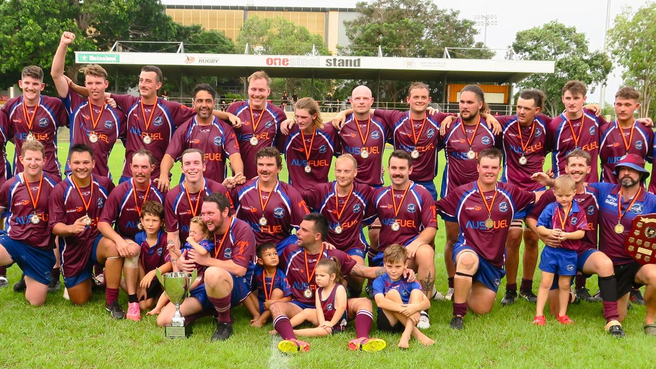 Swampdogs celebrating their 17-15 NTRU B-grade Grand Final victory over the Casuarina Cougars. Picture: Darcy Jennings.