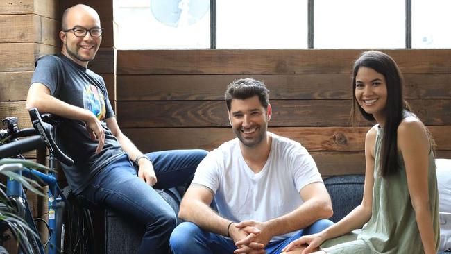 Canva co-founders Cameron Adams, Cliff Obrecht and Melanie Perkins staff worldwide will only have to come in eight days a year. Picture: Supplied