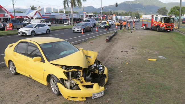 A stolen early model Mitsubishi Lancer crashed into a power pole on Anderson St earlier this year. Picture: Peter Carruthers