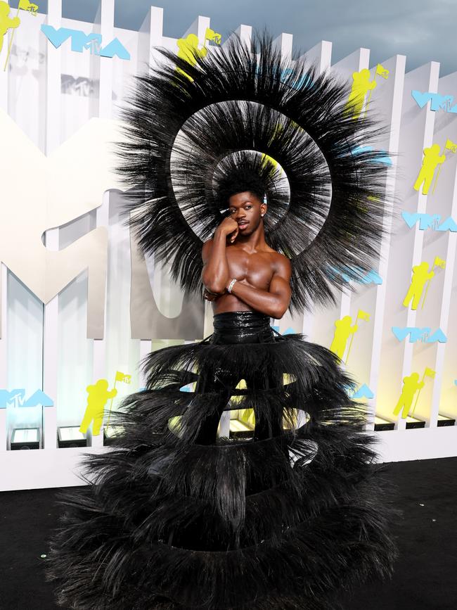 Lil Nas X in a Harris Reed design at the MTV VMAs. Image credit: Getty