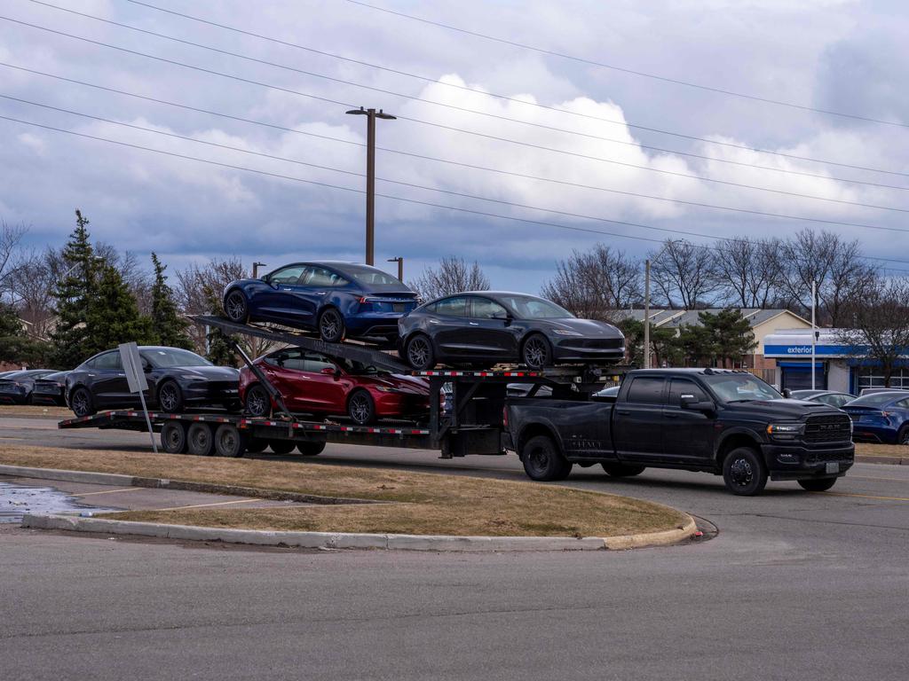 According to Hamilton Police, upwards of 80 Teslas parked outdoors were damaged on Wednesday — the largest act of vandalism against the US electric carmaker in Canada to date. (Photo by Katherine KY Cheng / GETTY IMAGES NORTH AMERICA / Getty Images via AFP)