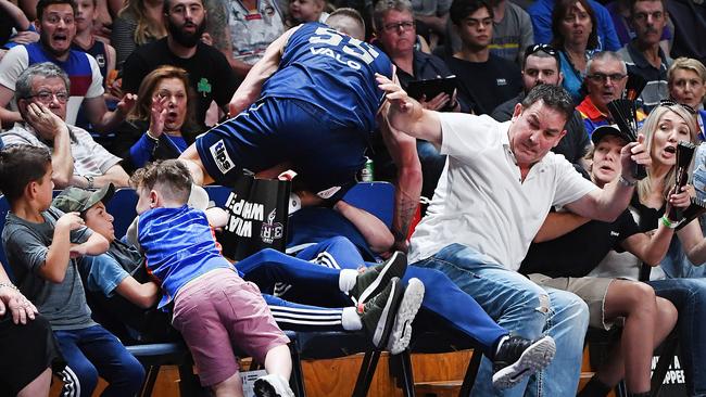 Creek can stop himself, and into the crowd he goes. Picture: Mark Brake/Getty