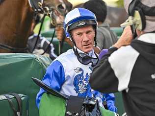 Jockey Jim Byrne reflects on his winning ride aboard Ice Frost at Ipswich racetrack. Picture: Cordell Richardson