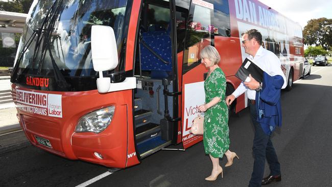 Daniel Andrews and wife Catherine Andrews board the Labor bus in Noble Park. Picture: AAP