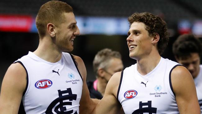 Liam Jones and Charlie Curnow celebrate a win against St Kilda late last season.