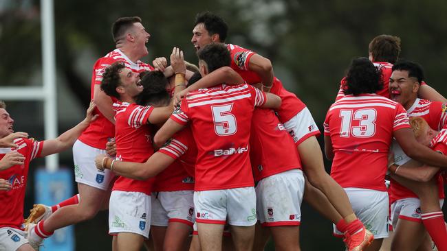 Illawarra South Coast Dragons celebrate win in the Laurie Daley SLE Cup Grand Final. Picture: Sue Graham