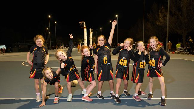 St Joseph’s Gold under-11 netball team pull their funniest faces.