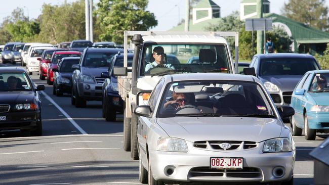 Traffic slows to a crawl along Bundall Road during peak hour.