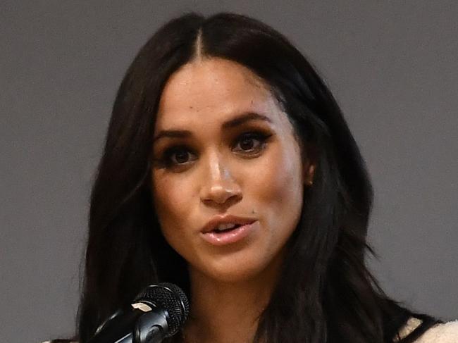 (FILES) In this file photo taken on March 06, 2020 Britain's Meghan, Duchess of Sussex speaks during a school assembly as part of a visit to Robert Clack School in Essex, on March 6, 2020, in support of International Womenâs Day. - Meghan Markle has revealed she suffered a miscarriage in July this year, writing in the New York Times on November 25, 2020 of the deep grief and loss she endured with her husband Prince Harry. (Photo by BEN STANSALL / POOL / AFP) / == STRICTLY EMBARGOED == NO USE AND NO PUBICATION ON ANY PLATFORM UNTIL 22:30 GMT MARCH 7, 2020 ==