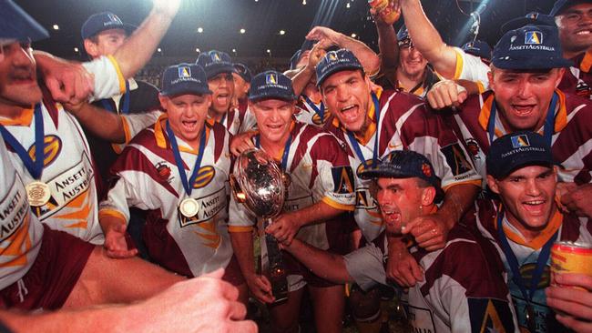 Brisbane Broncos celebrate defeat of Cronulla Sharks in 1997 Super League grand final at ANZ Stadium 21/09/1997.