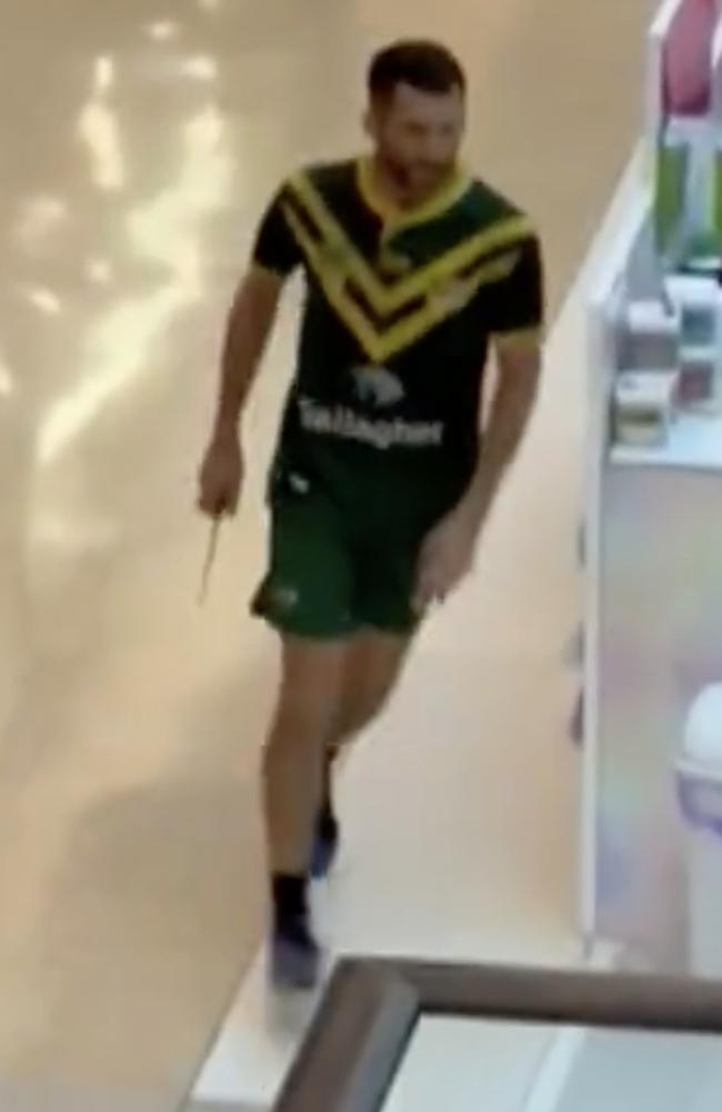 People fled as the man stalked through the shopping centre. Picture: 9 NEWS