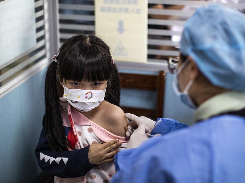 A child receives a vaccine against Covid-19 Wuhan, China. Picture: Getty Images