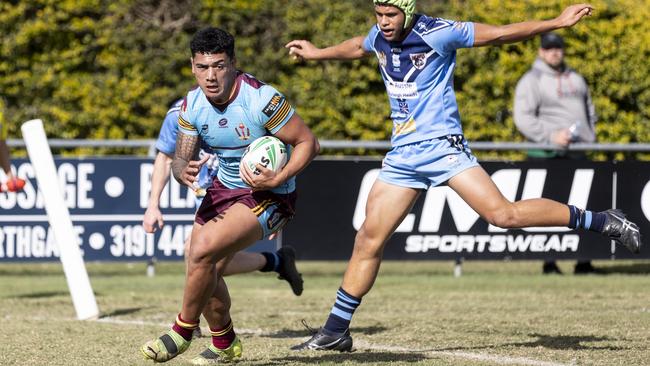 Keebra Park winger Jeremiah Tamepo scoring a try against Marymount College.