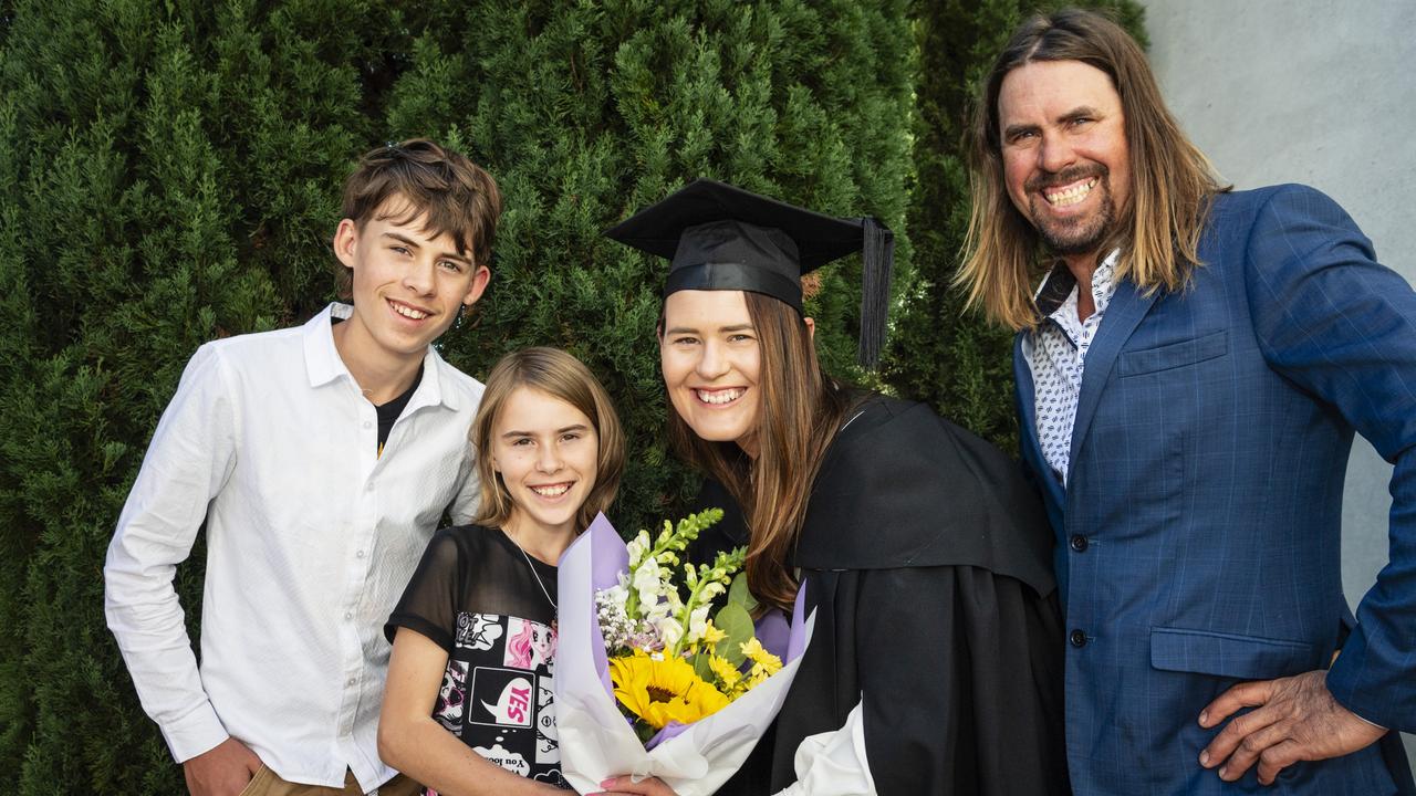 South Burnett Regional Council Cr Kirstie Schumacher celebrates her Bachelor of Communication and Media with son Decklan, daughter Grace and husband Wayne Schumacher at a UniSQ graduation ceremony at Empire Theatres, Tuesday, June 27, 2023. Picture: Kevin Farmer