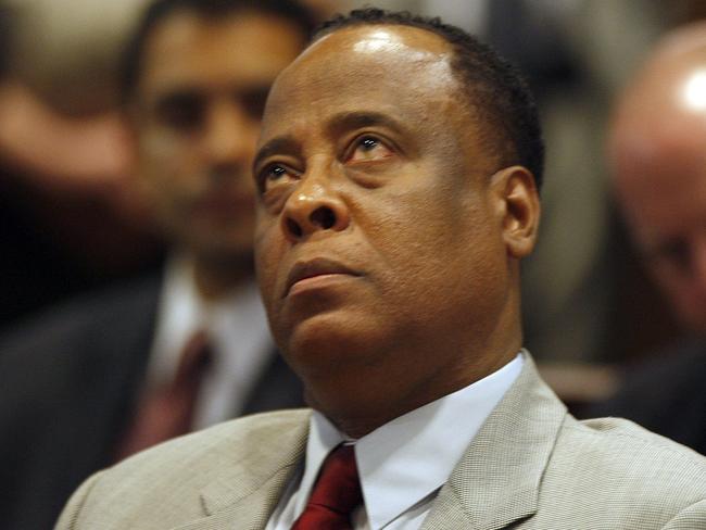 Dr Conrad Murray looks upward while he listens to the prosecution's case during his arraignment in the LA County Superior Airport Courthouse on charges of involuntary manslaughter into the death of client and singer Michael Jackson.