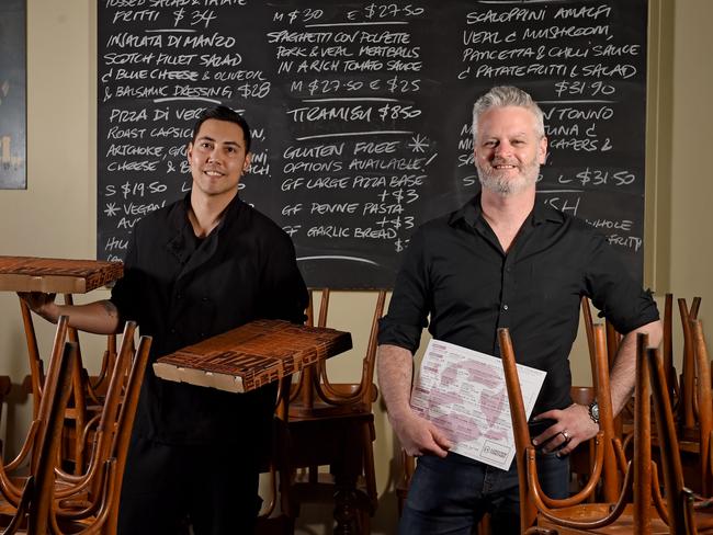 30.3.2020 - Amalfi's co-owner Frank Hannon-Tan (grey hair) at his restaurant in Frome Street with staff member, chef Chatchawan Simpson. Frank is hoping the government's wage subsidy plan will help employees at his business. Photo - Naomi Jellicoe