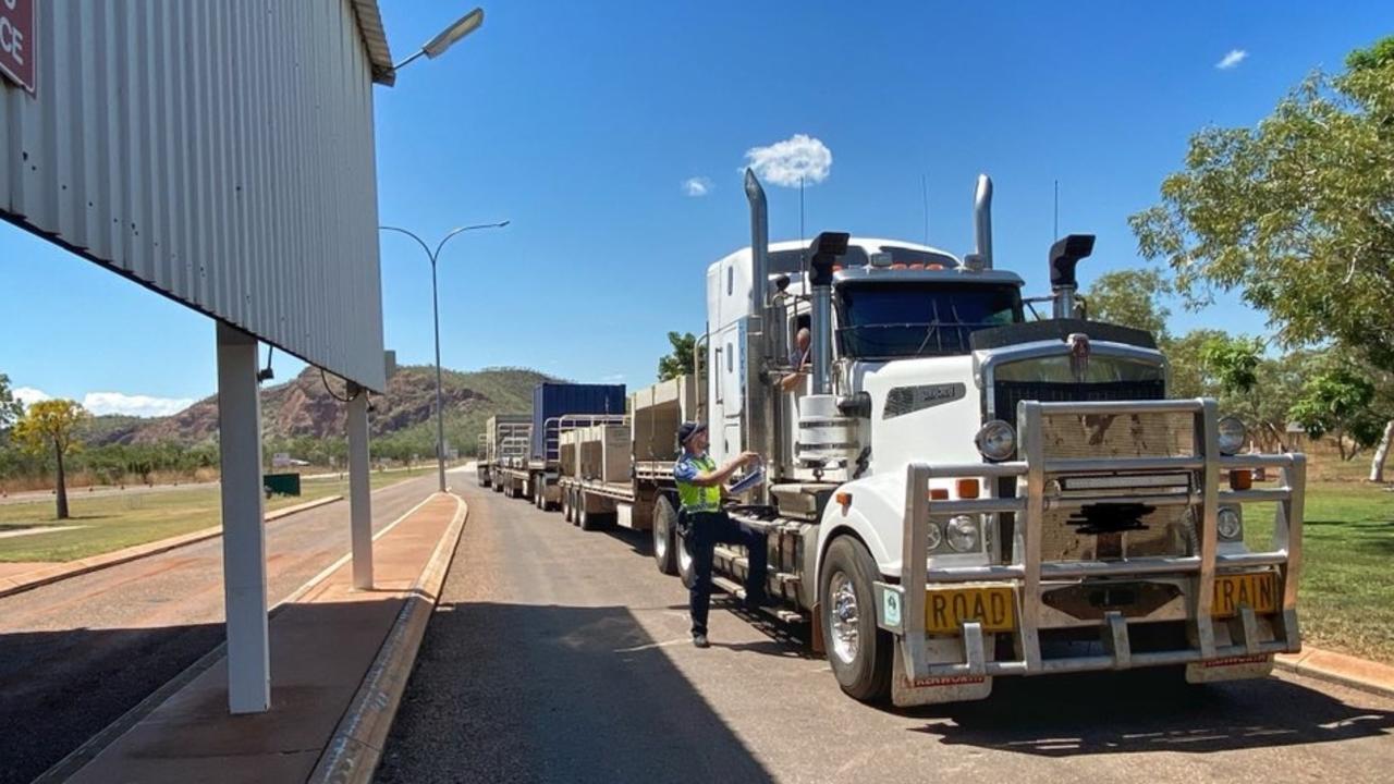A truck pauses at the South Australia-Western Australia border.