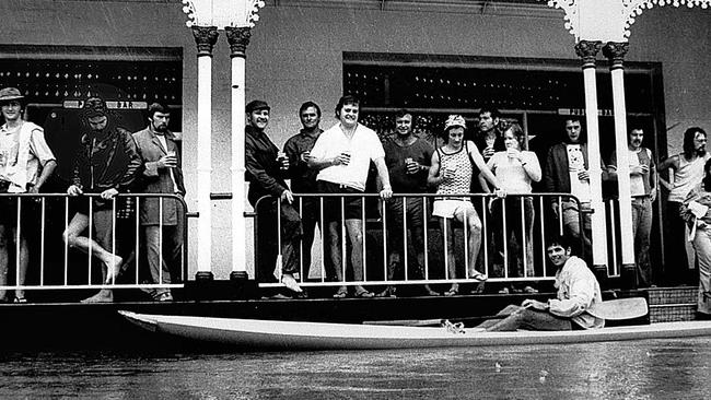 Patrons on the veranda of the Regatta Hotel at Toowong.