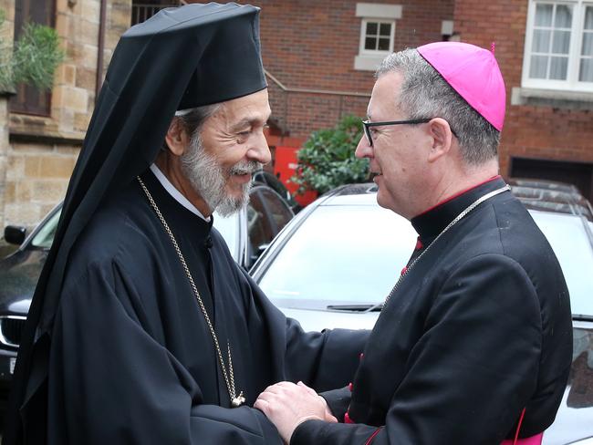 Bishop Seraphim of Apollonias and Catholic Bishop of Bathurst Michael McKenna at the funeral of Archbishop Stylianos held at the Greek Orthodox Church in Redfern. Picture: Richard Dobson