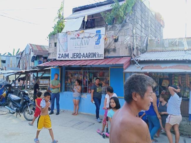 Outside of the premises where 12-year-old girl was rescued in the Philippines.