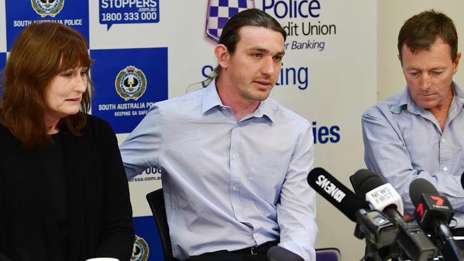 Michael Purse’s mother, Donna Ipers, his brother Andrew Purse, and father Jeffrey Purse during a police press conference in 2019. Picture: Mark Brake