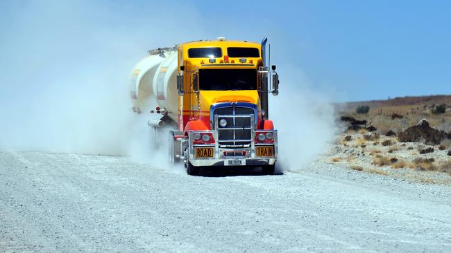 A road train on the Strzelecki Track. Heavy vehicles average only 35km/h on the Track, according to department figures.