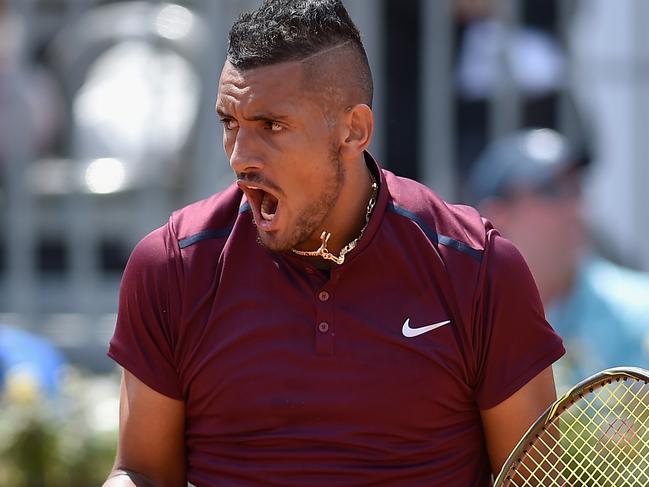 ROME, ITALY - MAY 09: Nick Kyrgios of Australia celebrates a point in his match against Salvatore Caruso of Italy on Day Two of The Internazionali BNL d'Italia 2016 on May 09, 2016 in Rome, Italy. (Photo by Dennis Grombkowski/Getty Images)