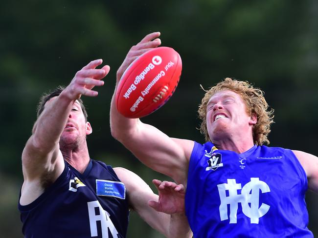 Pictured is the Nepean Football Netball League round 16 game of Australian Rules Football Hastings (royal blue and white with white shorts) versus Rosebud (navy blue and white with navy blue shorts) at Thomas Barclay oval in Hastings. Ben Dwyer and Josh Mulheron. Picture: Derrick den Hollander