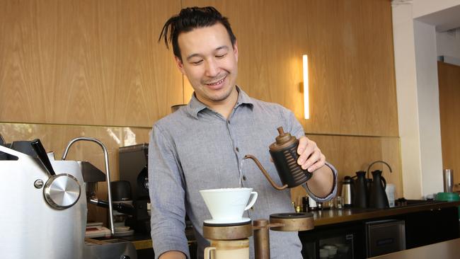 Barista Dan Yee at his Surry Hills Artificer Coffee shop. Photo: Bob Barker.