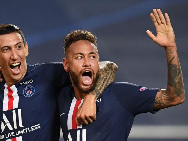 (FILES) In this file photo taken on August 18, 2020 Paris Saint-Germain's Argentine midfielder Angel Di Maria (L) celebrates with teammate Brazilian forward Neymar after scoring their team's second goal during the UEFA Champions League semi-final football match between Leipzig and Paris Saint-Germain at the Luz stadium in Lisbon. - Paris Saint-Germain forward Neymar, the world's most expensive footballer, has tested positive for coronavirus, sources told AFP on September 2, 2020. The 28-year-old Brazilian has Covid-19 as well as his Argentinian teammates Angel Di Maria and Leandro Paredes, the same anonymous sources said. (Photo by David Ramos / POOL / AFP)