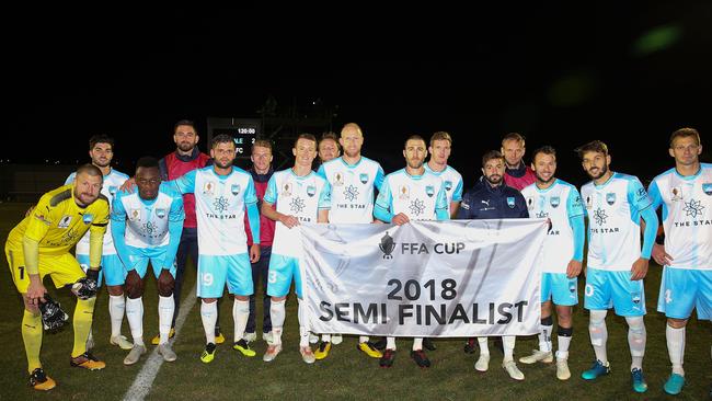 Sydney FC pose with their FFA qualification flag. Picture: Getty